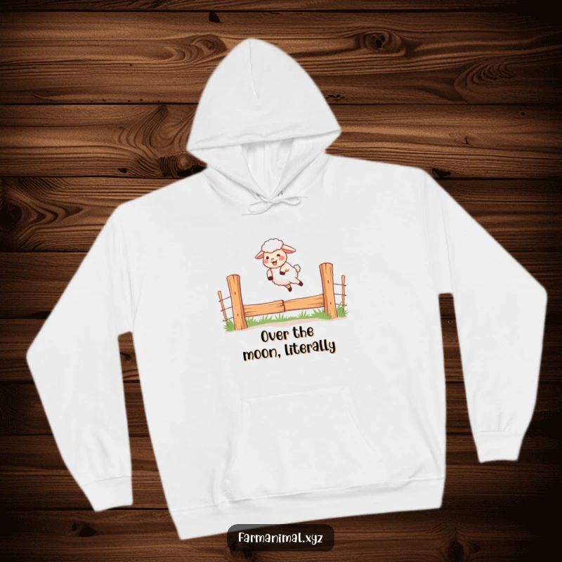 Funny hoodie featuring a giggling sheep jumping over a fence, perfect for cozy, playful moments.
