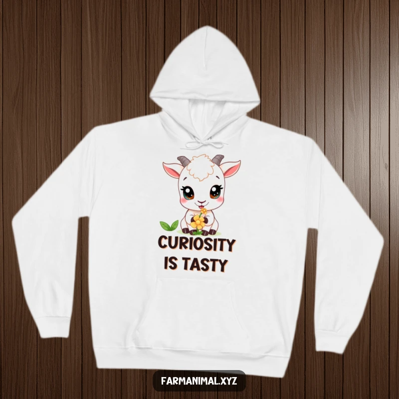 Funny goat hoodie showing a curious goat with wide, expressive eyes delicately nibbling on a bloom.