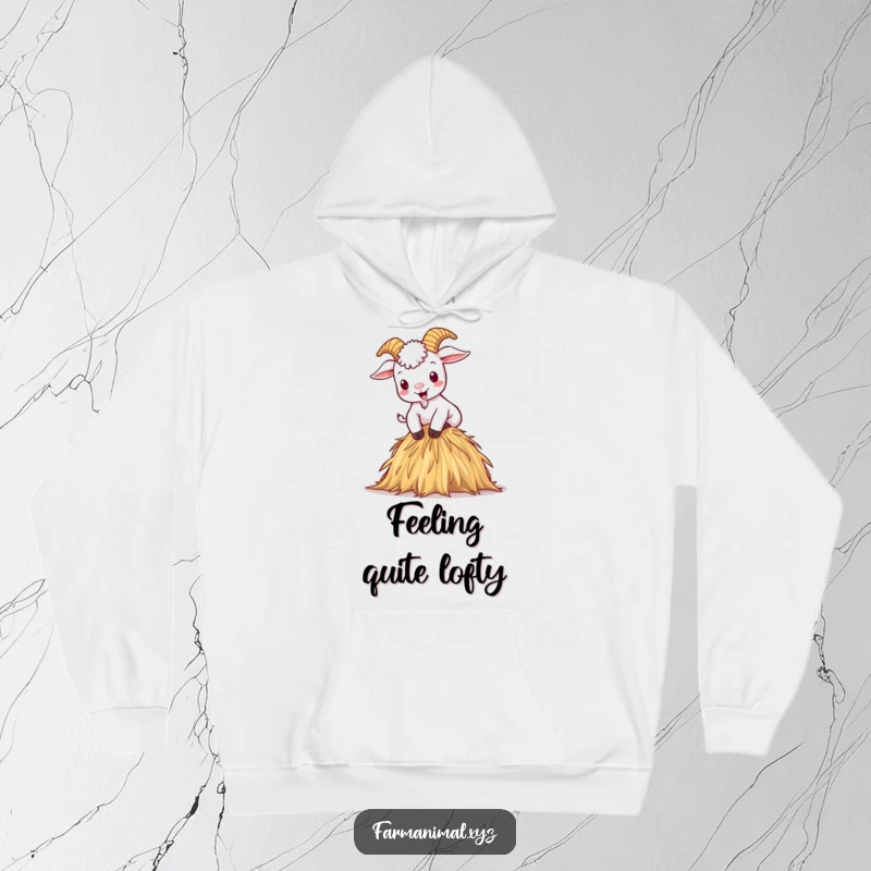 Funny hoodie with a mischievous cartoon goat climbing a haystack with glee, perfect for cozy days.