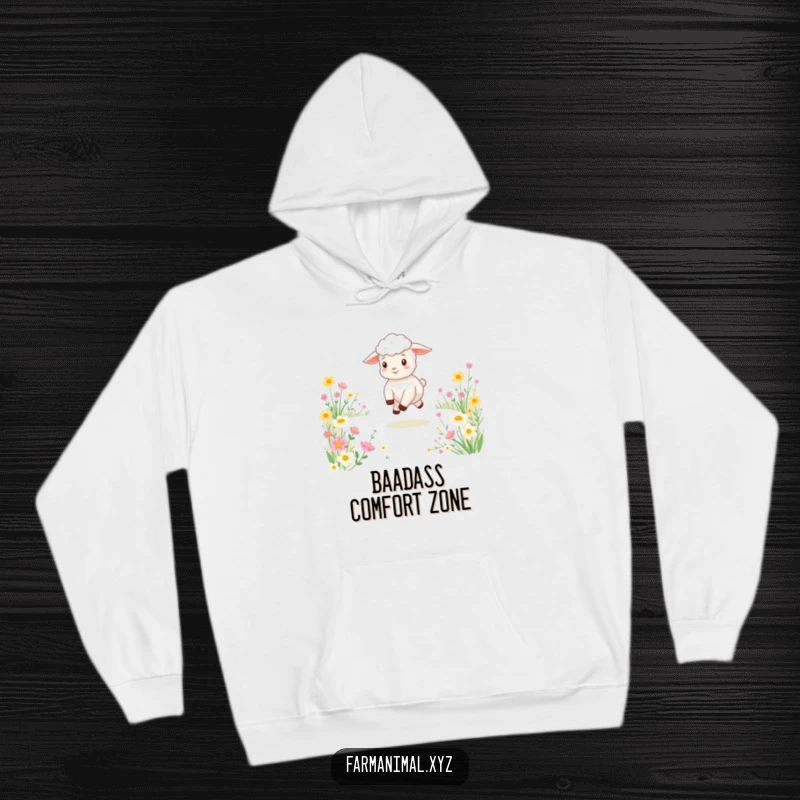 Funny hoodie showcasing a cute lamb leaping playfully through a colorful flower-filled field, embodying boundless energy and joy.