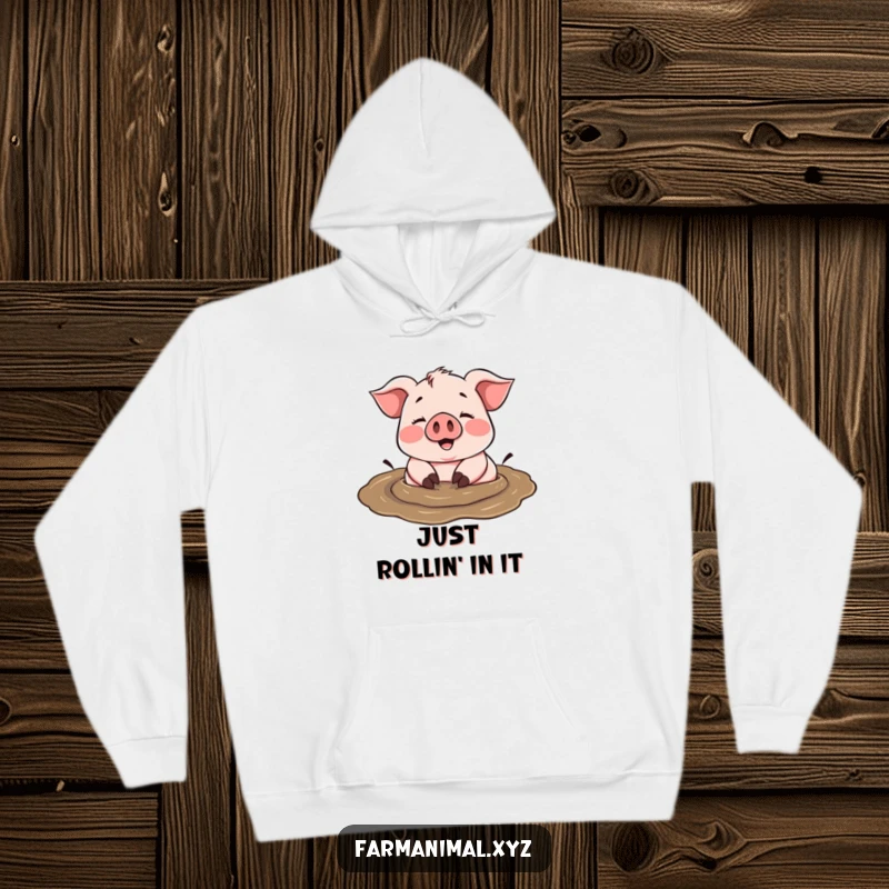 Funny cheerful pig happily rolling in a mud puddle, exuding happiness and comfort on a cozy hoodie.