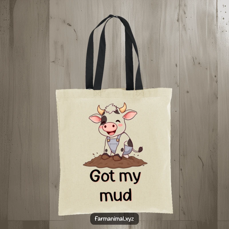 Funny cow wearing overalls happily stomping in mud, a humorous and practical tote bag for farm lovers.