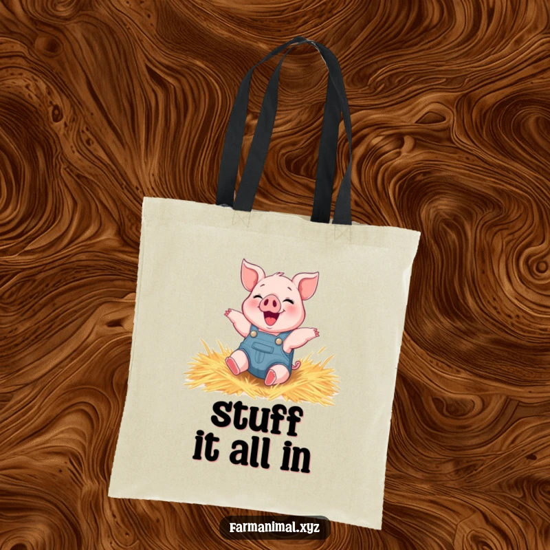 Funny piglet tote bag featuring a happy piglet in overalls gleefully rolling in a pile of hay.